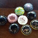 9 champagne dopjes
